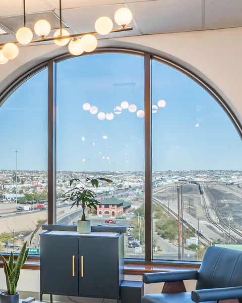 Arched window with the El Paso skyline