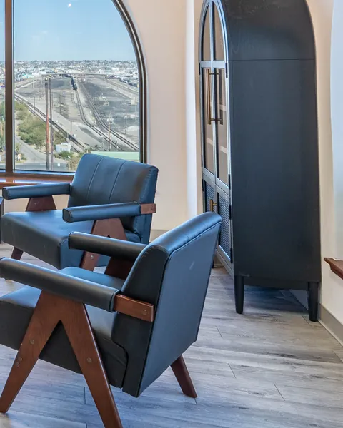 Chairs and cabinet in the client lounge