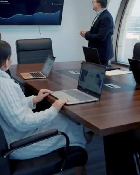 Laptops on the boardroom table