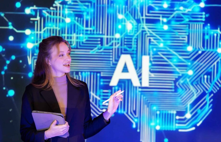 Confident speaker in a professional outfit presents artificial intelligence AI concepts at a technology conference