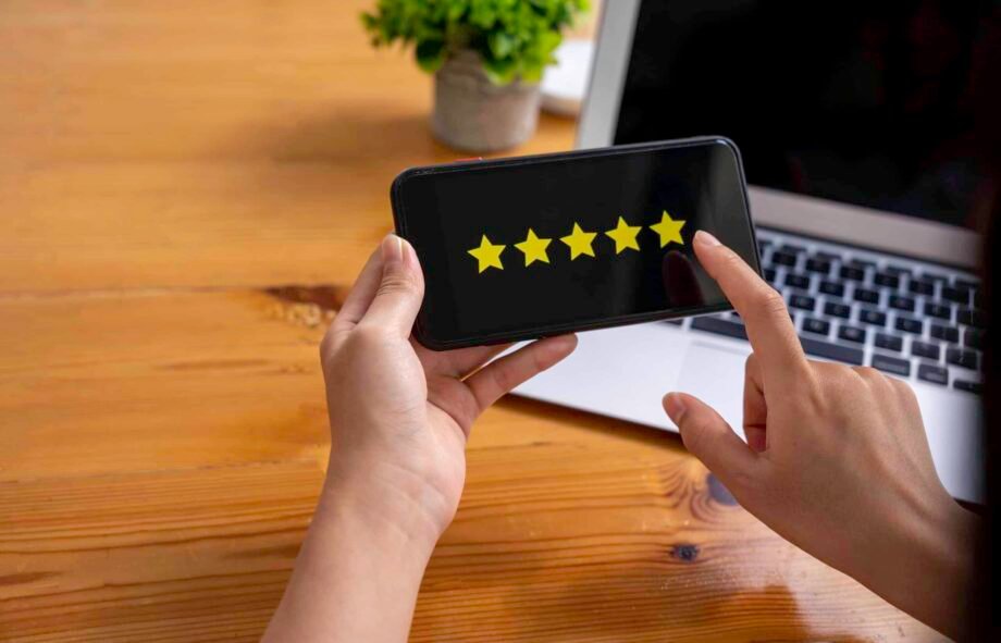 business woman using mobile phone Rate your satisfaction after shopping online. through a smartphone application
