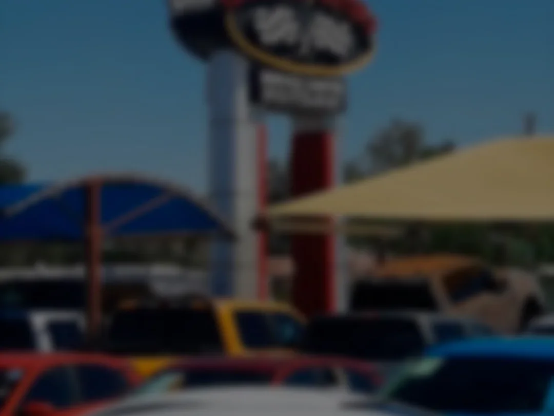 Torresdey Motors case study: the Torresdey Motors dealership lot in El Paso, where Bedrock Digital rebuilt tracking and search ads