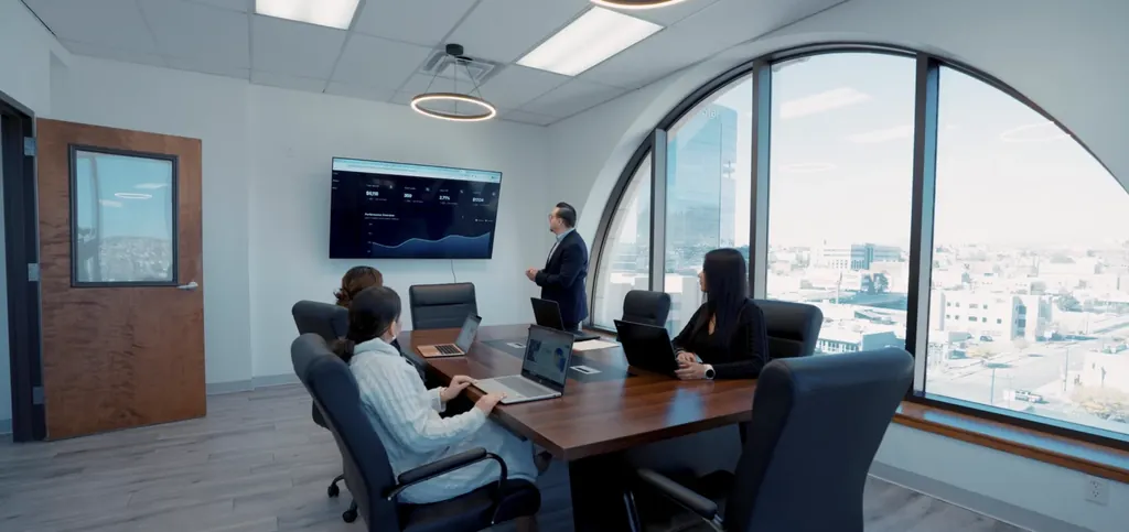 Ecommerce marketing agency team: Bedrock Digital team reviewing campaign results in the El Paso boardroom